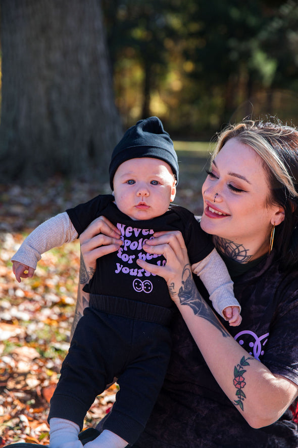 Never Apologize Baby Onesie