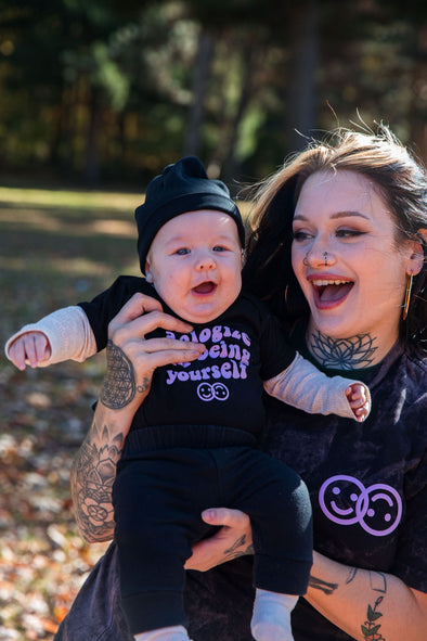 Never Apologize Baby Onesie